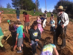 North Fork Elementary students in their school garden with Hansel Kern